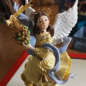 Angel Figurine with Flowers and Wings